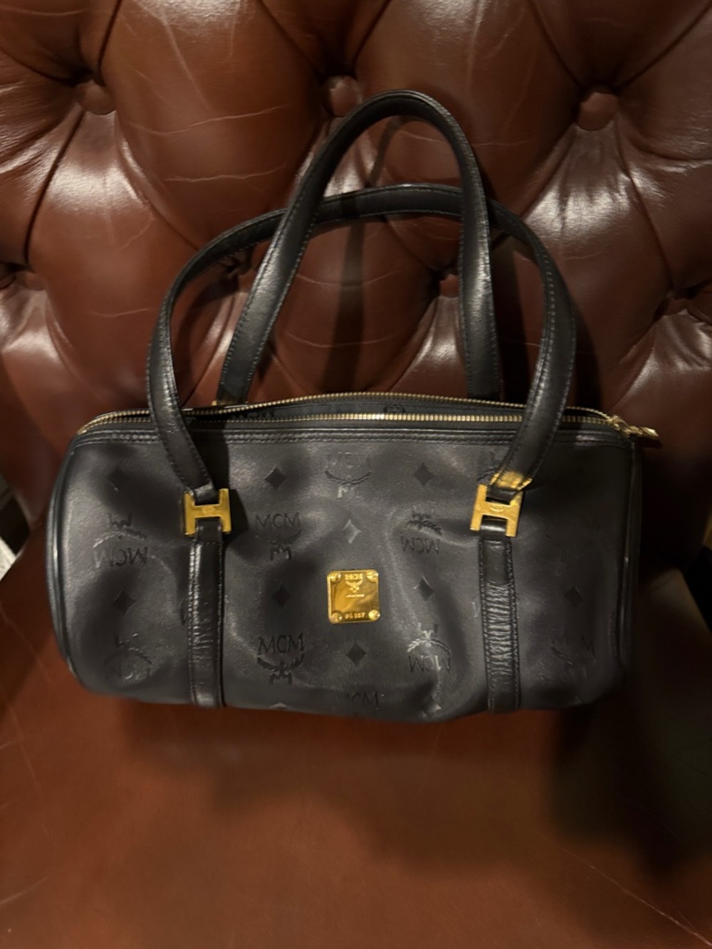 MCM Black Leather handbag with Gold Plaque quite luxury sophisticated stylish